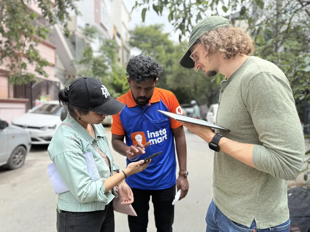 NJM crew discussing a shot together on location